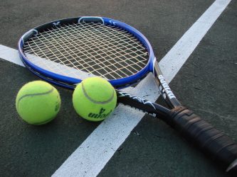 11 tennis racket and balls